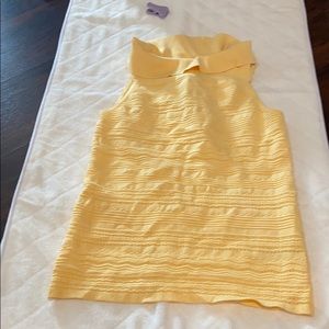 White House black market yellow sleeveless shirt